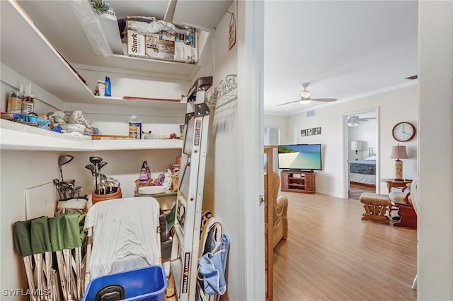 interior space featuring ceiling fan