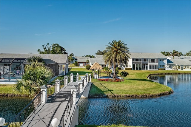1515 Myerlee Country Club Blvd Unit 6, Fort Myers, FL 33919 - dock area featuring a water view and a lawn