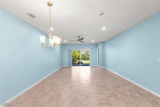 unfurnished room with ceiling fan with notable chandelier, recessed lighting, visible vents, and baseboards