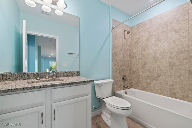 bathroom featuring visible vents, toilet, tile patterned floors, bathtub / shower combination, and vanity