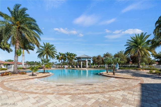 community pool featuring a gazebo