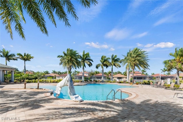 community pool featuring a patio area