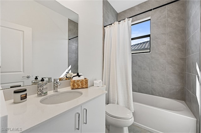 full bathroom with vanity, toilet, and shower / bath combo