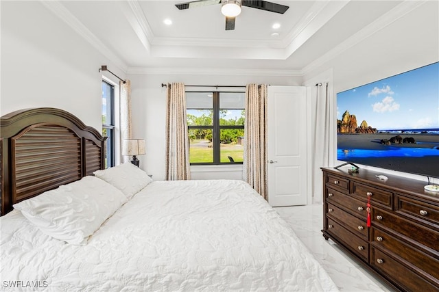 bedroom featuring ornamental molding, a tray ceiling, and marble finish floor