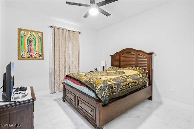 bedroom with marble finish floor, ceiling fan, and baseboards