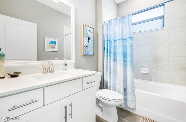 bathroom with shower / tub combo, vanity, toilet, and wood finished floors