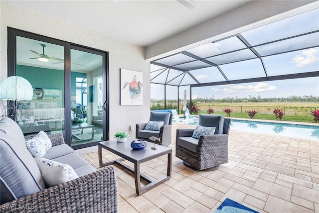 view of patio featuring glass enclosure, outdoor lounge area, and an outdoor pool