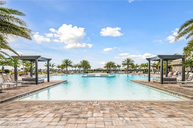 community pool with a patio