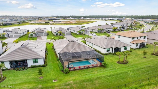 birds eye view of property with a residential view