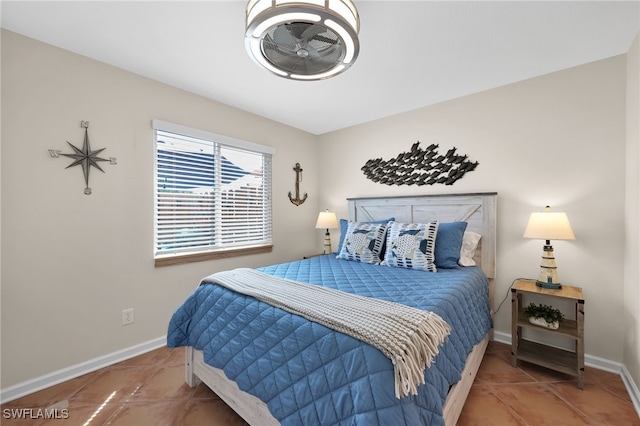 tiled bedroom with baseboards