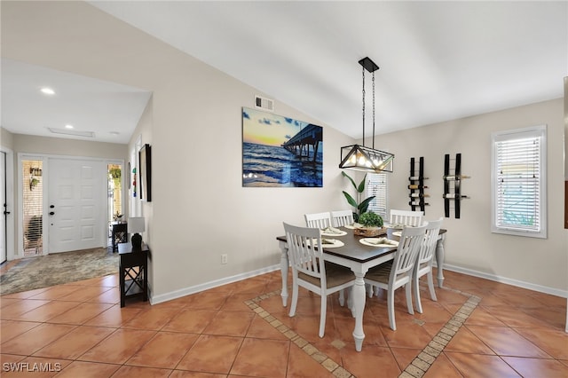 dining area with visible vents, baseboards, and light tile patterned floors