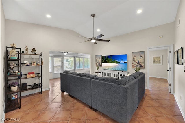 living room with lofted ceiling, recessed lighting, light tile patterned flooring, ceiling fan, and baseboards