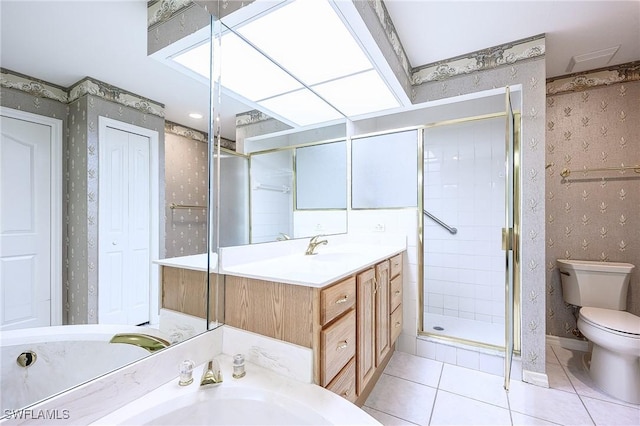 bathroom featuring wallpapered walls, toilet, a stall shower, tile patterned floors, and vanity