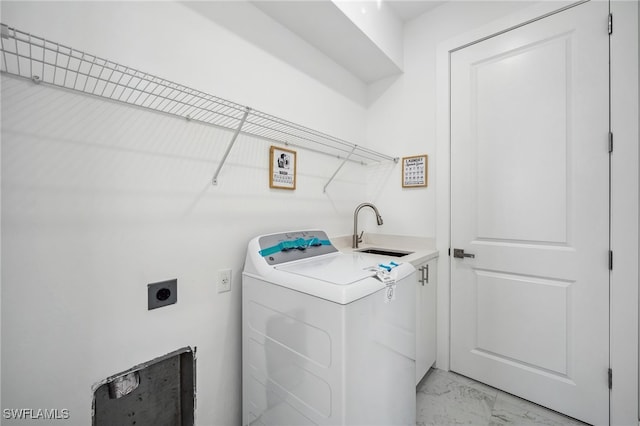 laundry room with washer / dryer, marble finish floor, and a sink