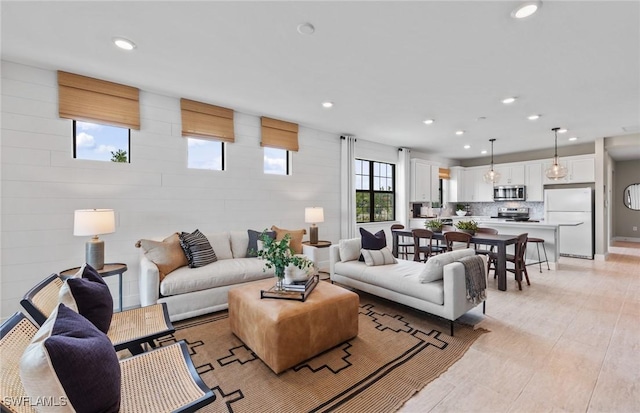 living room featuring recessed lighting