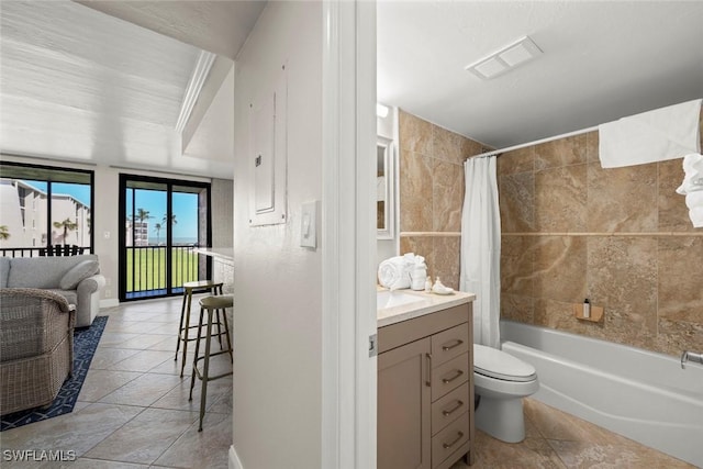 full bath with vanity, visible vents, shower / bath combo, tile patterned flooring, and toilet