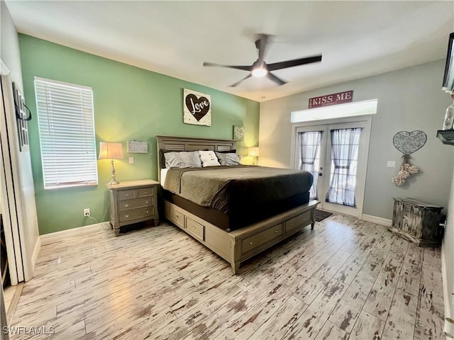 bedroom with access to exterior, french doors, a ceiling fan, light wood-type flooring, and baseboards