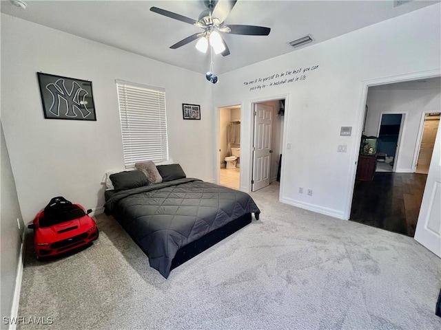 bedroom with connected bathroom, a ceiling fan, visible vents, baseboards, and carpet