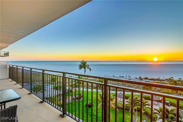 balcony at dusk with a water view