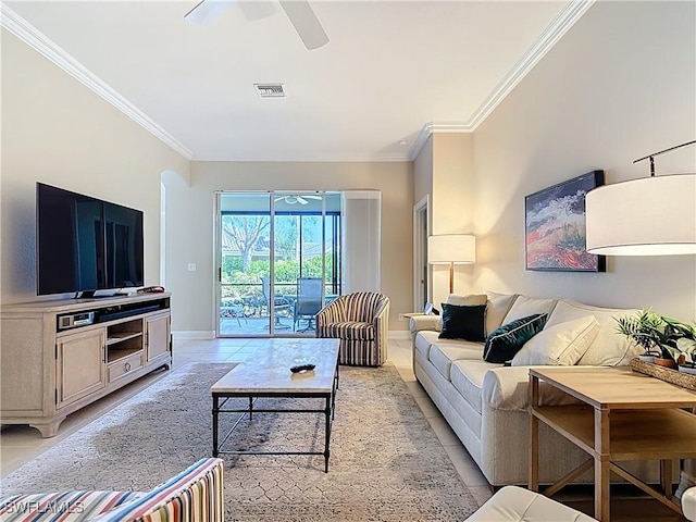 living room featuring light tile patterned floors, visible vents, and a ceiling fan