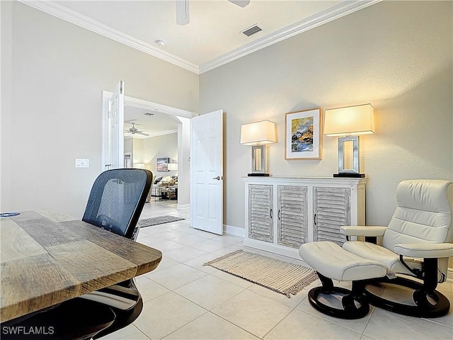 office area with visible vents, light tile patterned flooring, crown molding, baseboards, and ceiling fan