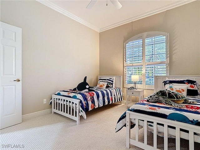 bedroom with baseboards, carpet, ornamental molding, and a ceiling fan