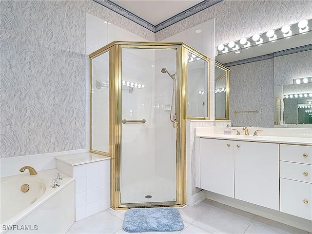 bathroom with wallpapered walls, a shower stall, and tile patterned floors