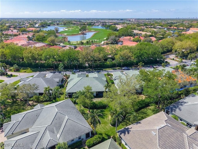 birds eye view of property featuring a residential view and a water view