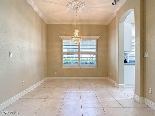 unfurnished room featuring crown molding, light tile patterned flooring, baseboards, and arched walkways