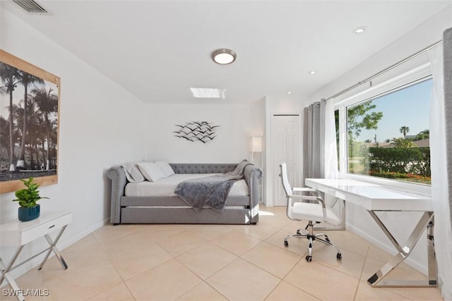 bedroom featuring tile patterned flooring, visible vents, recessed lighting, and baseboards