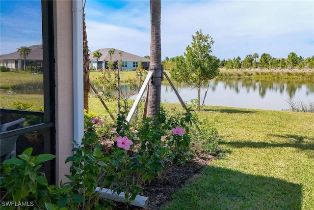 view of yard with a water view