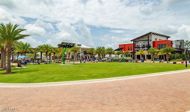 view of home's community featuring a lawn