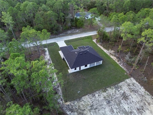 aerial view featuring a forest view