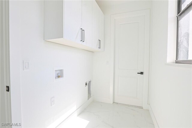 clothes washing area with marble finish floor, hookup for a washing machine, cabinet space, hookup for an electric dryer, and baseboards