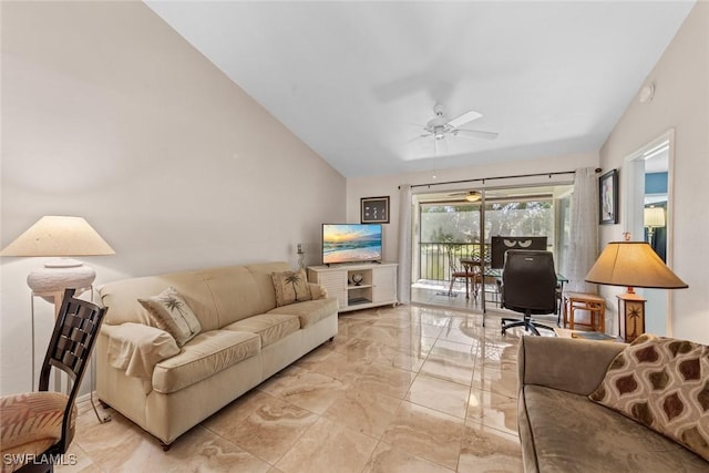 living area featuring lofted ceiling and marble finish floor