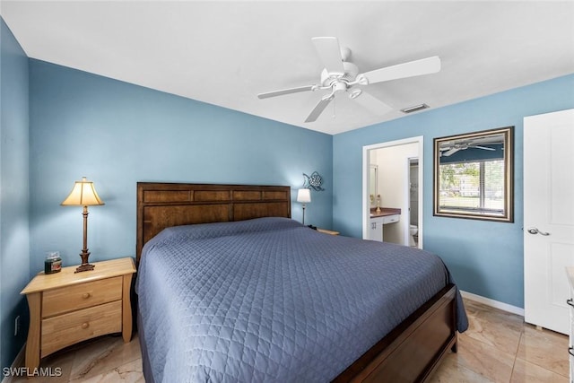 bedroom with a ceiling fan, connected bathroom, visible vents, and baseboards