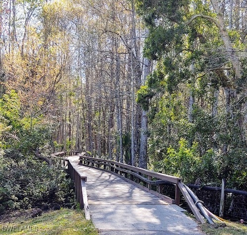 surrounding community with a forest view