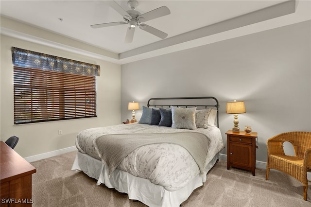 bedroom with carpet, baseboards, and ceiling fan