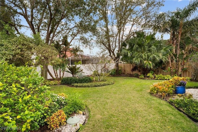 view of yard featuring fence