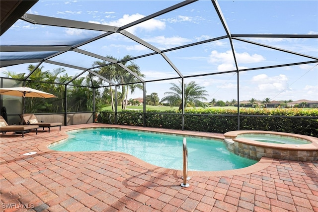 view of swimming pool with a pool with connected hot tub, glass enclosure, and a patio