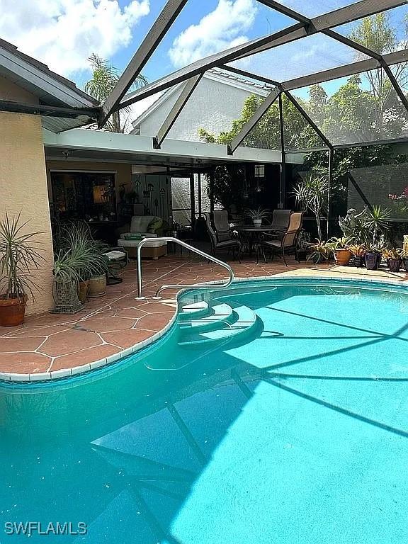 pool with a patio