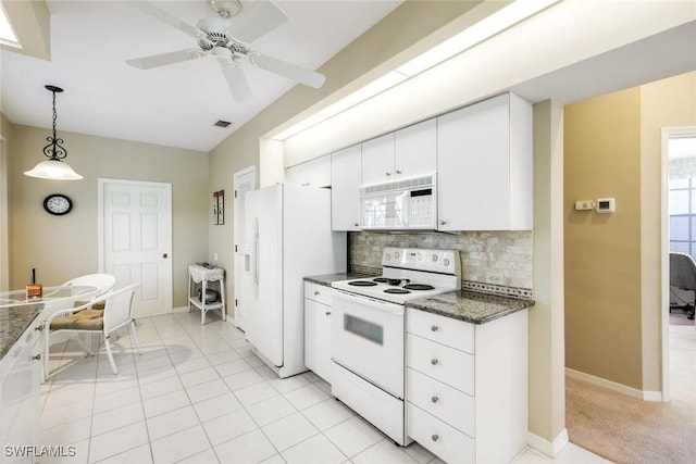 kitchen featuring white appliances, visible vents, white cabinets, decorative backsplash, and decorative light fixtures