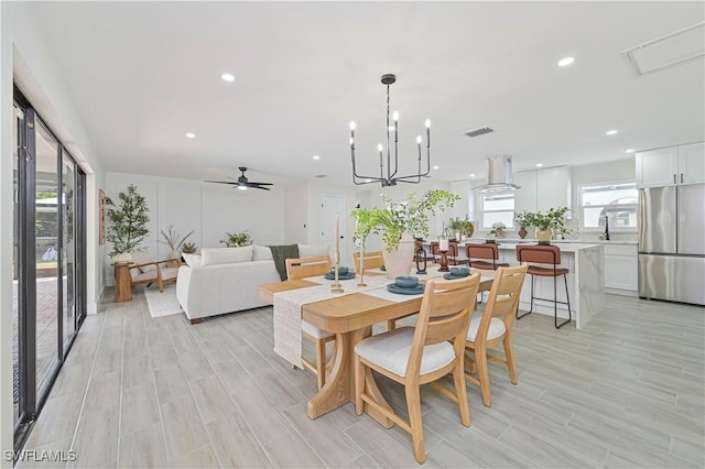 dining space with recessed lighting, visible vents, ceiling fan, and wood finish floors