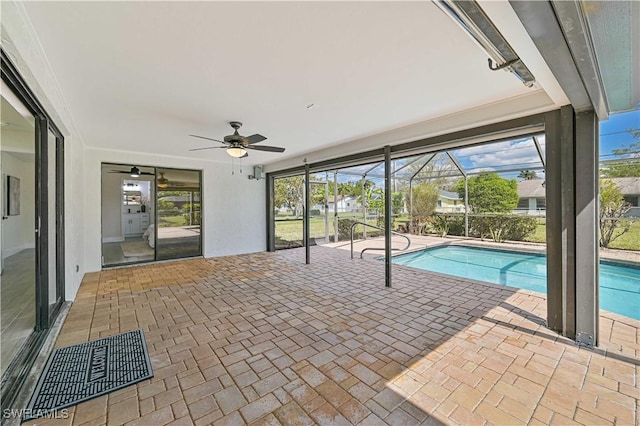 outdoor pool with a ceiling fan