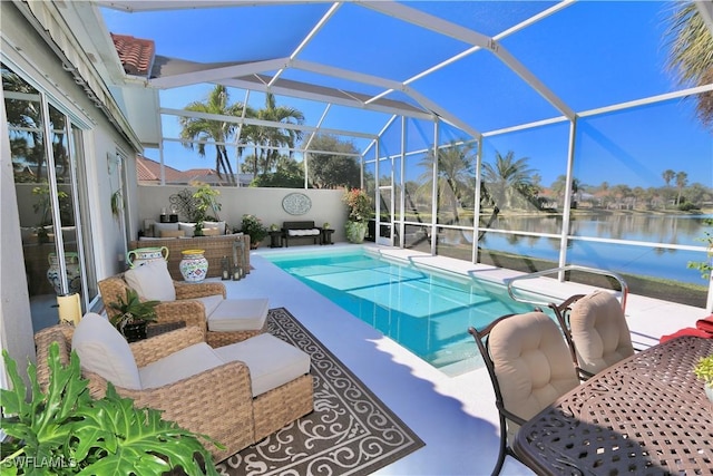 view of swimming pool featuring a lanai, outdoor lounge area, a water view, a fenced in pool, and a patio area