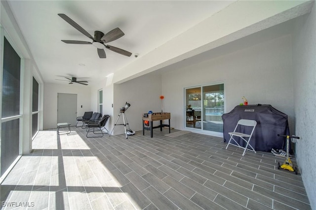 view of patio / terrace with a ceiling fan and area for grilling