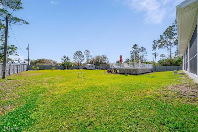 view of yard with fence