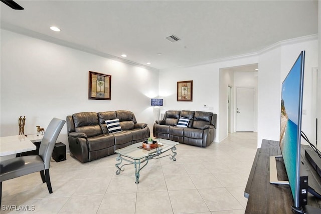 living room featuring light tile patterned floors, ornamental molding, visible vents, and recessed lighting