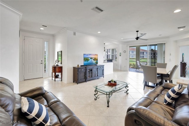 living room with crown molding, light tile patterned floors, recessed lighting, visible vents, and ceiling fan