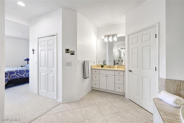 18911 Bay Woods Lake Dr Unit 101, Fort Myers, FL 33908 - full bathroom featuring tile patterned floors, vanity, and ensuite bathroom